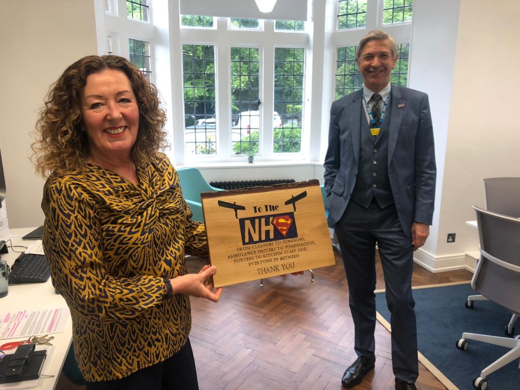 Dame Jackie and Sir John with NHS Thank You Plaque