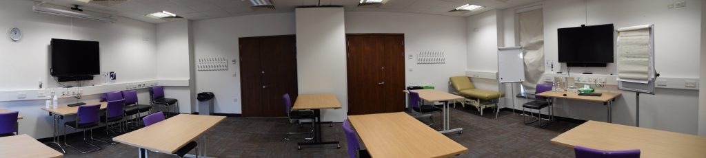 Panoramic view of SIM training rooms at the RVI where participants can view live screening of simulations from the clinical rooms