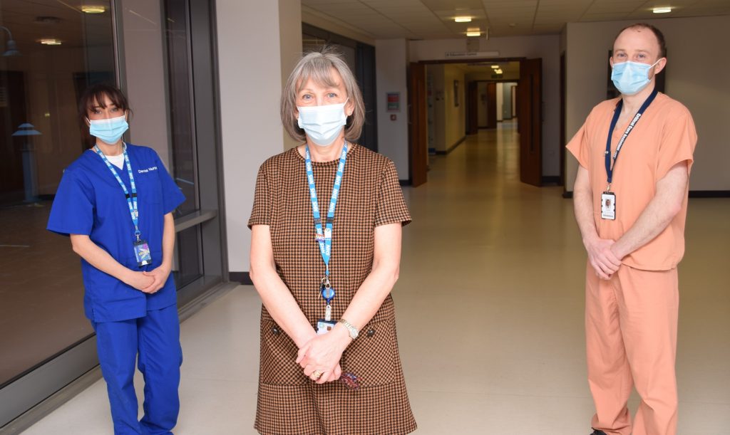 Susie Landreth (centre) with dental nurse daughter Michelle and critical care assistant son Stephen