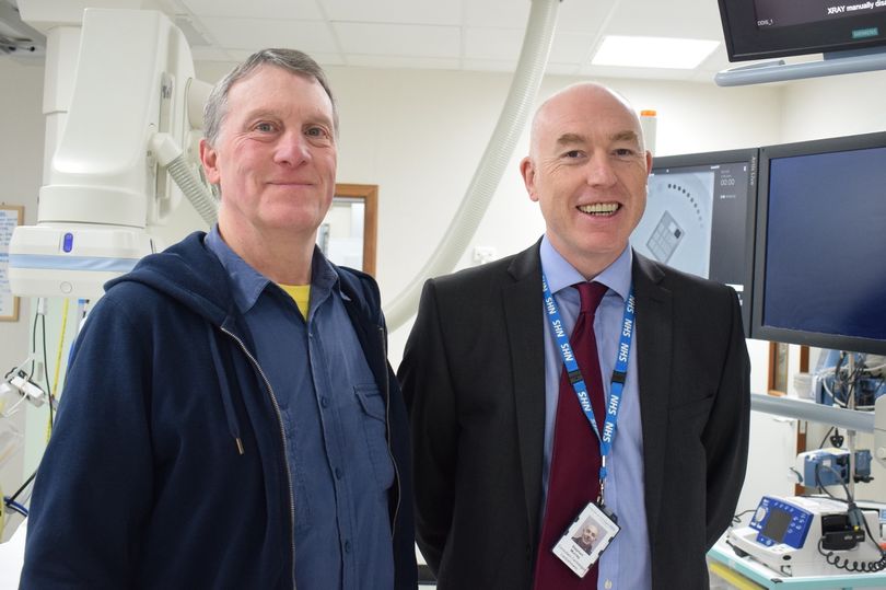 Patient Rod Stapley with Dr Stephen Murray in the catheter lab at Newcastle's Freeman Hospital