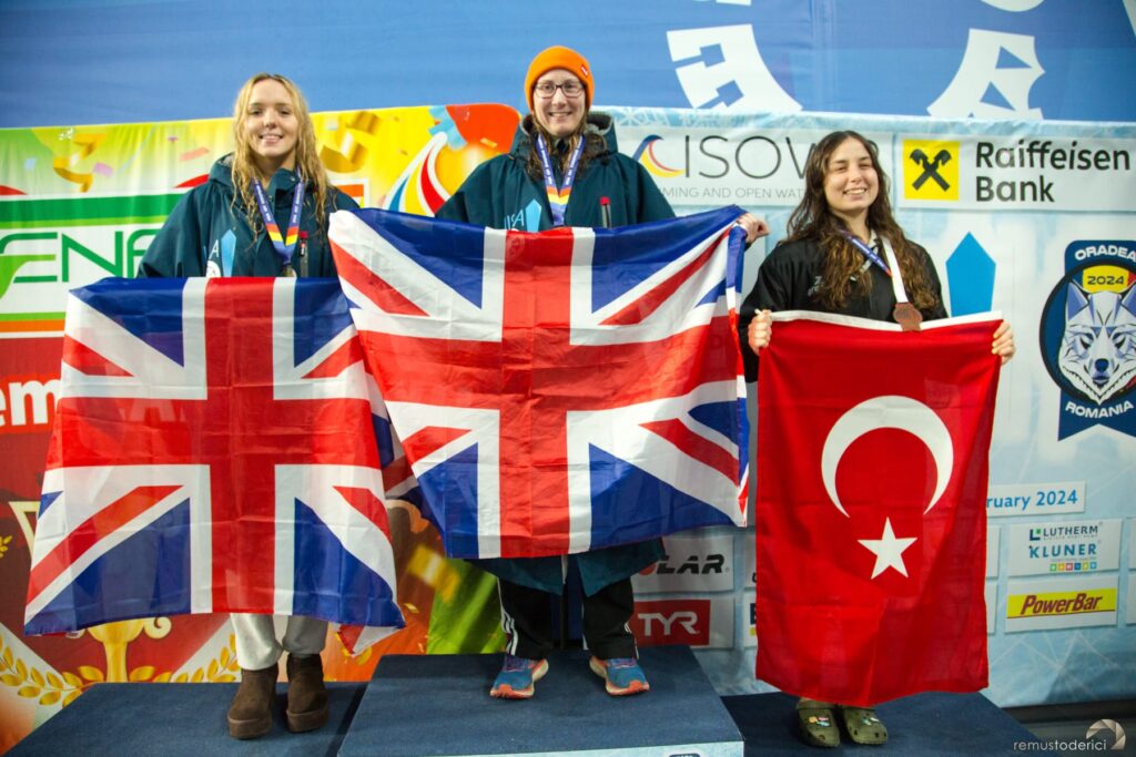 Melanie Hall in first place on the Medal Rostrum at the European Ice Swimming Championships February 2024