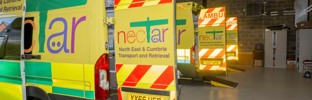 Picture of NECTAR yellow ambulances with the back doors open