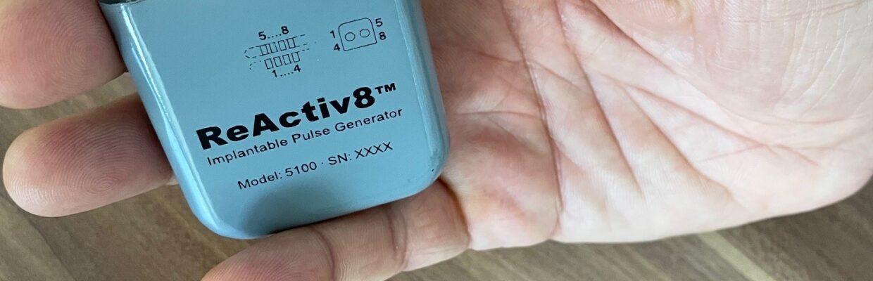 A picture of a hand holding a medical device