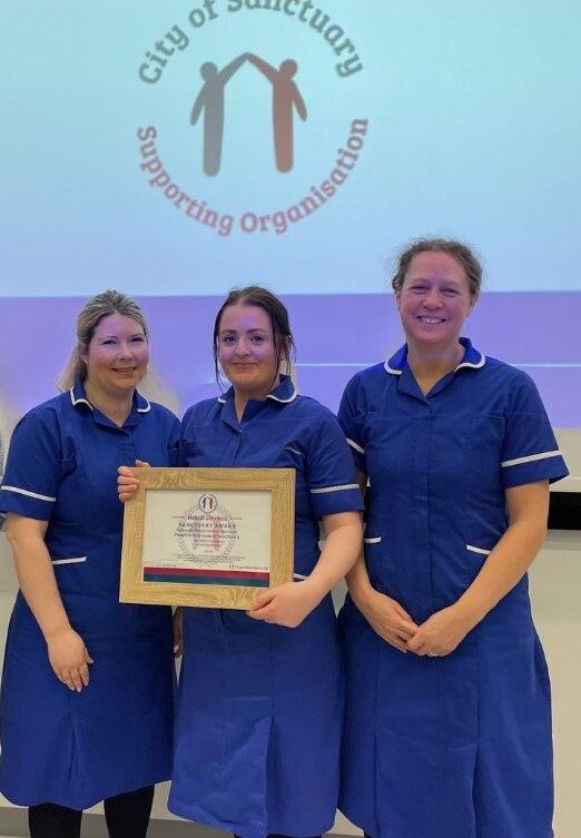 Community nurses with the City of Sanctuary Award.