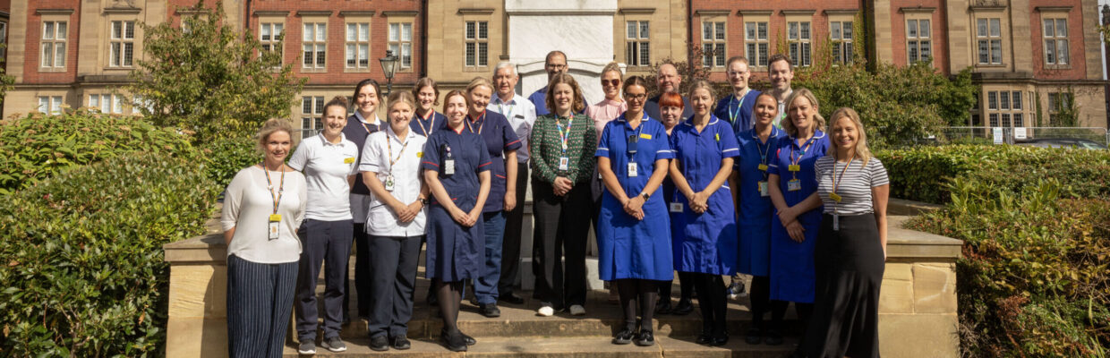 A photo of the Cystic Fibrosis team outside Peacock Hall