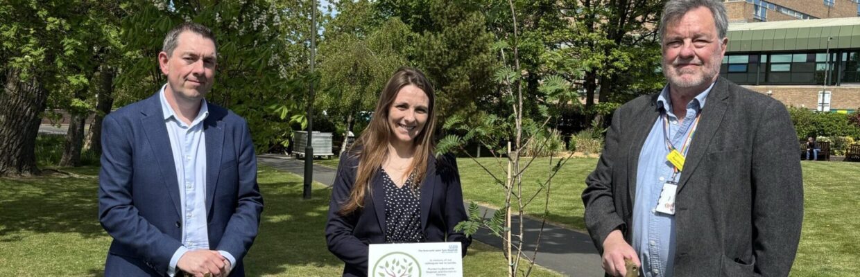 Rob Harrison, Jess Morgan and Paul Ennals planting a tree outside the Freeman Hospital