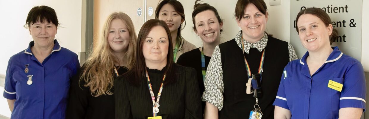 Picture of the acne service outside the dermatology clinic sign