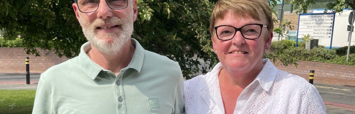 A man and a woman standing outside the freeman hospital
