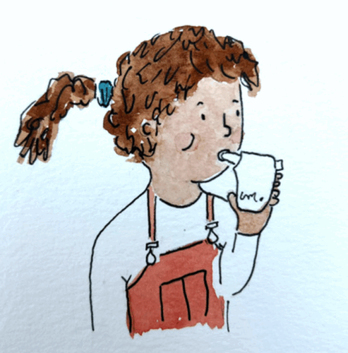 A picture of a girl blowing into a device