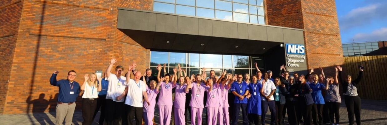 A group photo of hospital staff outside of the Community Diagnostic Centre