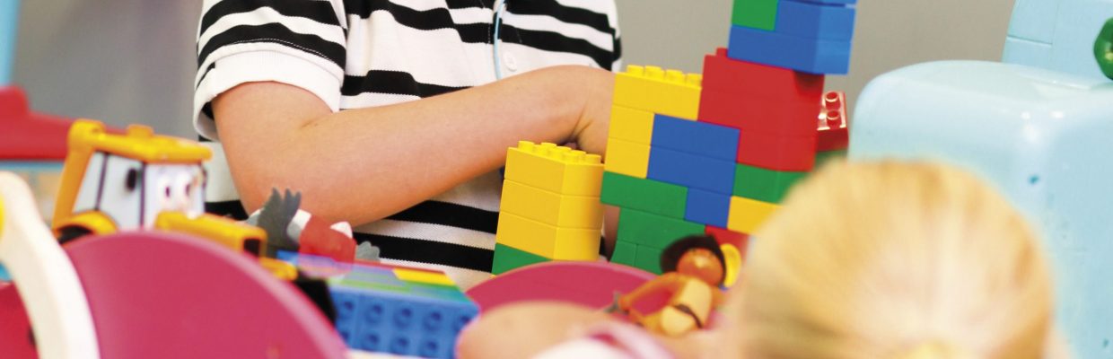 Children playing on a ward