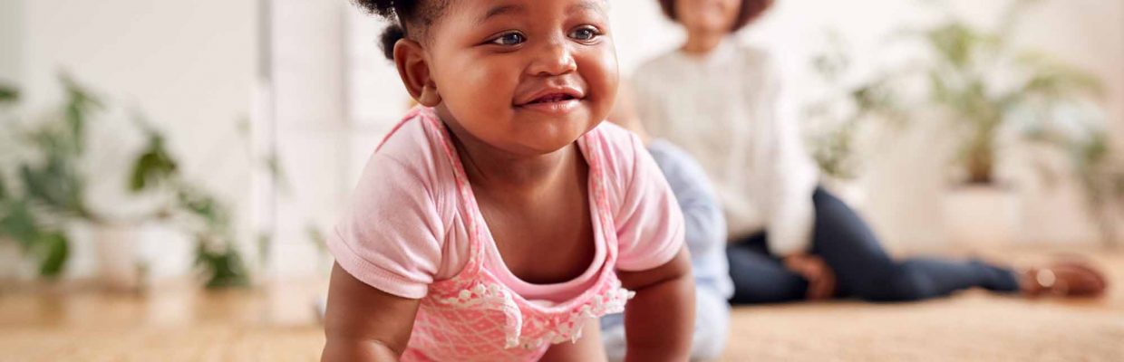 Two Mothers Meeting For Play Date With Babies At Home In Loft Apartment