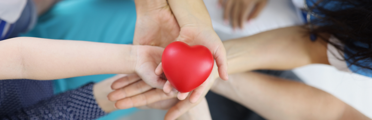 Hands holding a heart