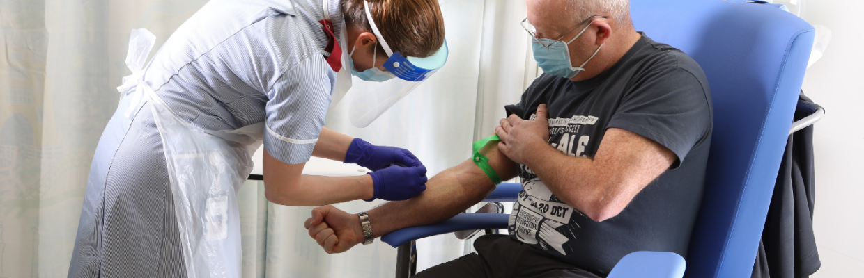Nurse taking blood from a patient