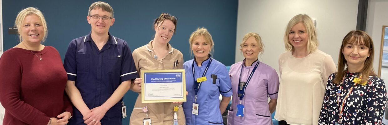 Claire Tawes with CNO HCSW Award and Regional Team