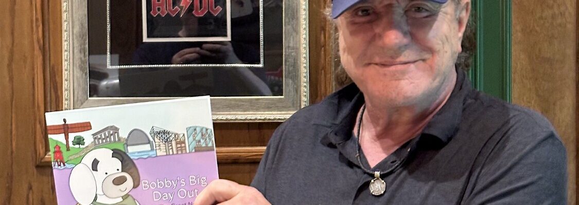Brian-Johnson-with-Bobbys-Big-Day-Out-Book