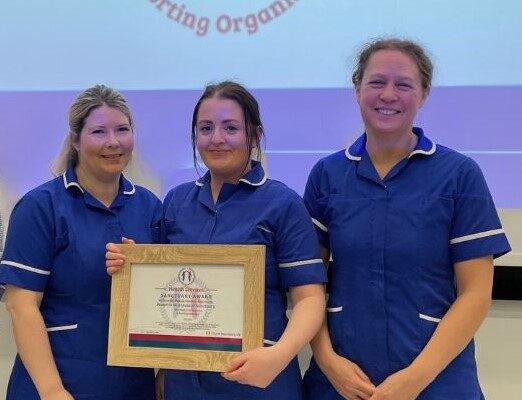 Community nurses with the City of Sanctuary Award.