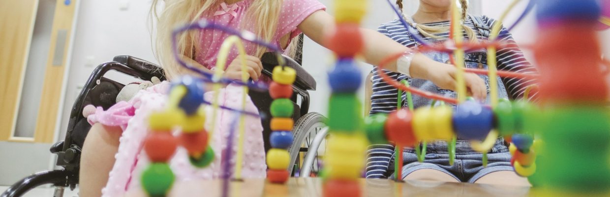 Children playing in a children friendly waiting area